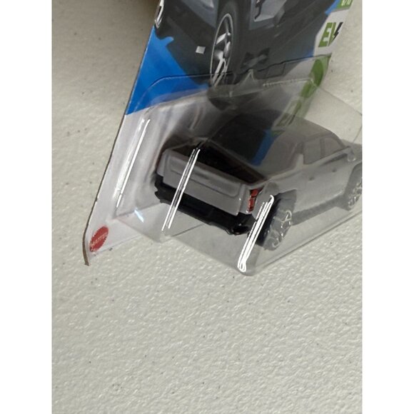 Hot Wheels 2024 Silverado EV RST HW EV 6/10 Gray Diecast New on Card - Picture 3 of 5